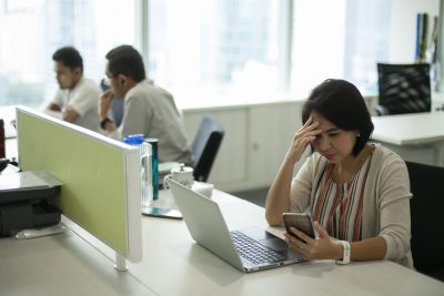 woman stress in office due to COVID-19